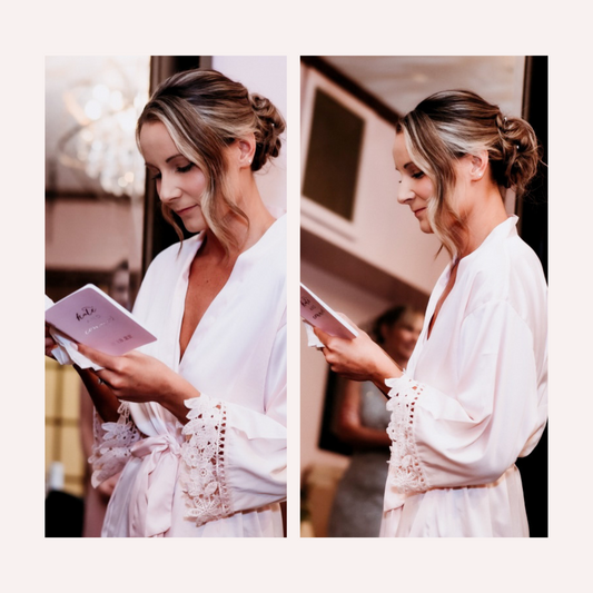 a bride reading her wedding vows in a blush pink wedding vow book that she wrote by understanding how to write your own wedding vows